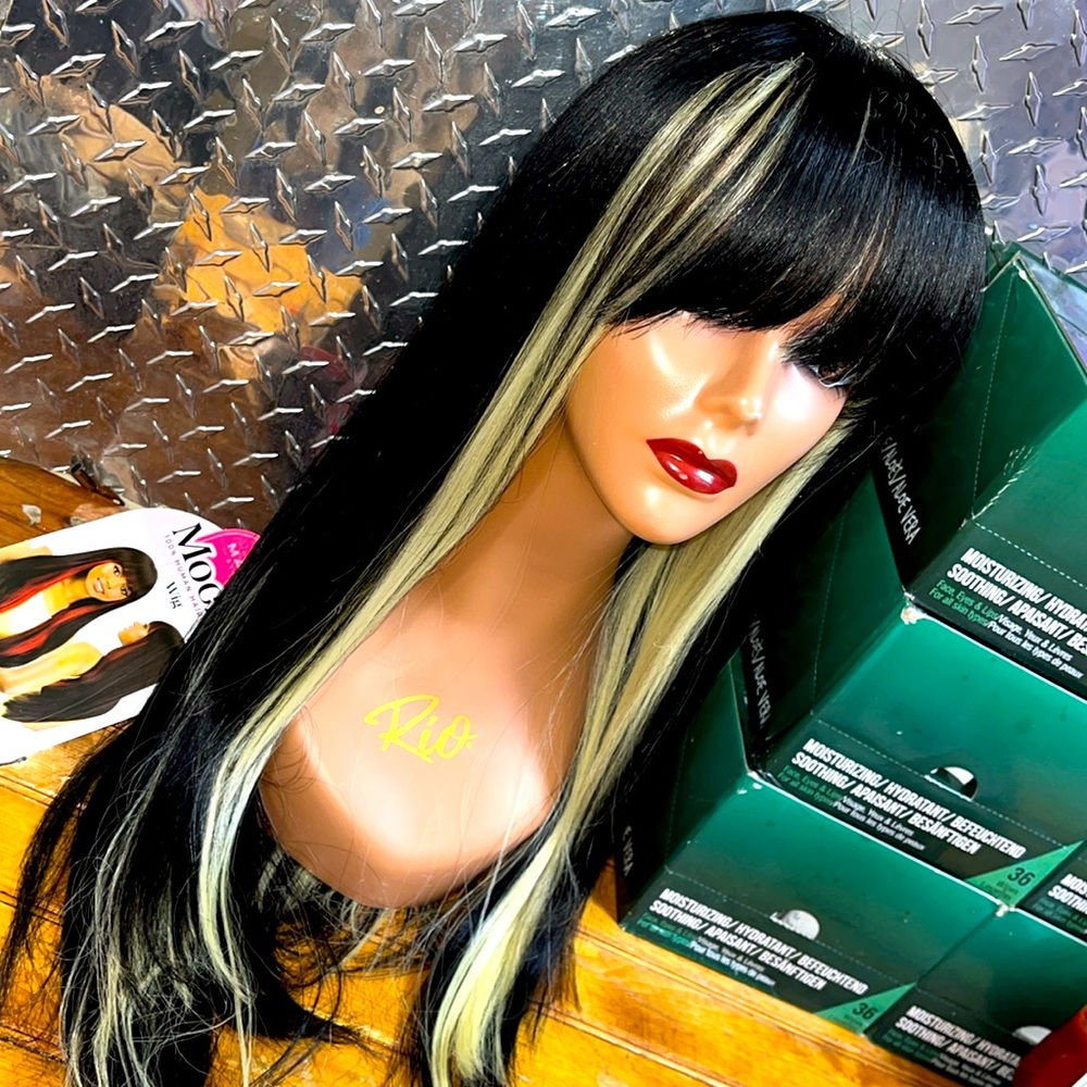 - Beautiful long textured wig with bang